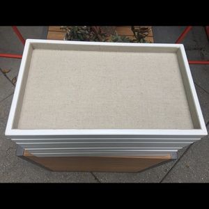 Jewelry trays with linen pad.